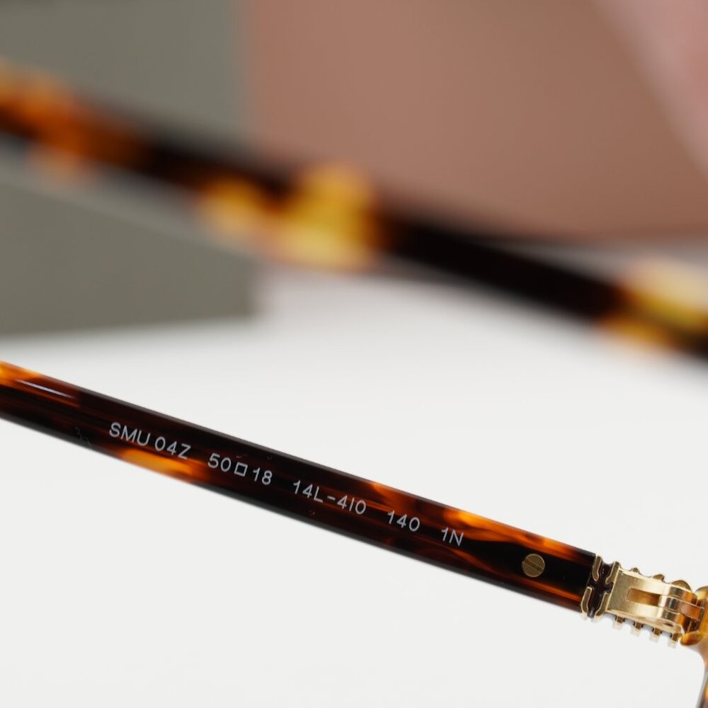 Miu Miu MU04ZS 14L4I0 Oval Sunglasses – Honey Havana\Pink - Picture 6 of 9